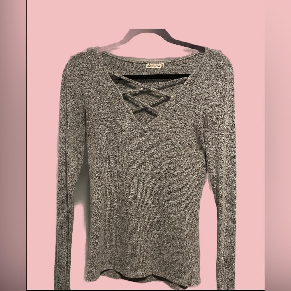 Grey long sleeve top with crossed patter in front